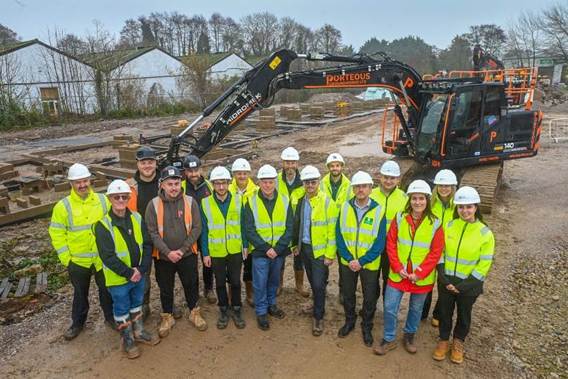 Large group of people on a building site